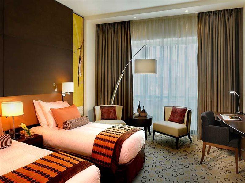 Asiana Hotel דובאי מראה חיצוני תמונה A room at the hotel