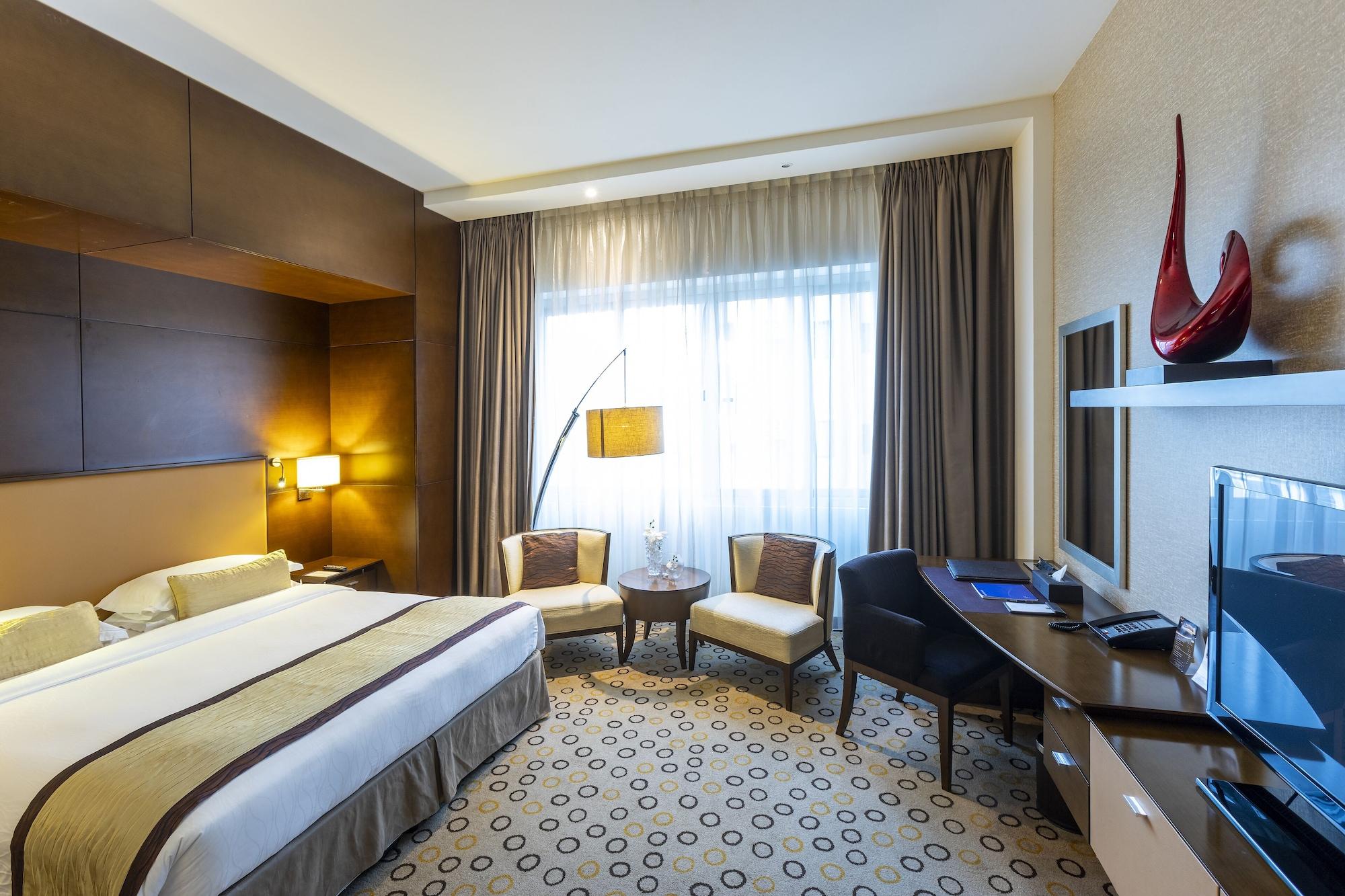 Asiana Hotel דובאי מראה חיצוני תמונה A room at the hotel