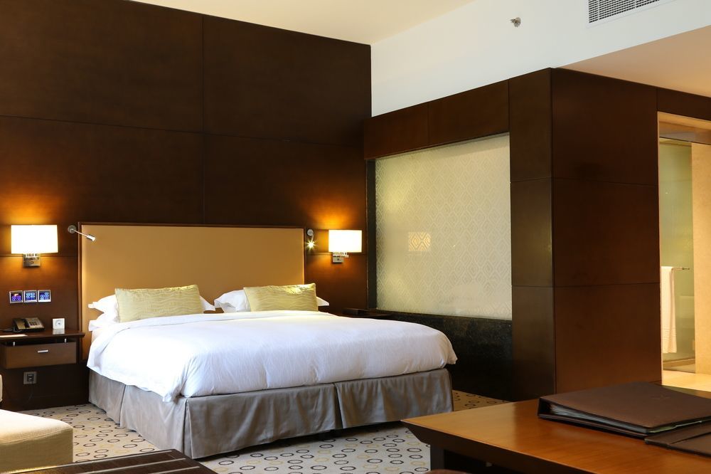 Asiana Hotel דובאי מראה חיצוני תמונה A bedroom at the hotel